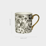 Black Floral Porcelain Mug with Gold Handle.