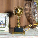 Big Gold World Globe Spinning Ball on Black Marble Base