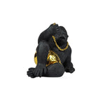  Black Gorilla Statue with Gold Accents.