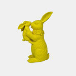 Bright Yellow Rabbit Statue with Floral Detail.