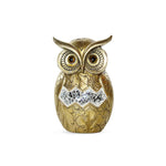 Golden owl ornament exudes luxury accents.