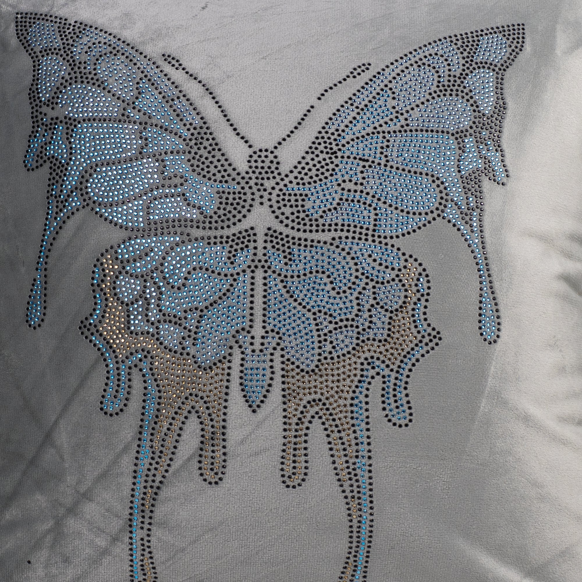 Gray Cushion Cover with Butterfly Design.