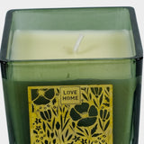Luxury Green Square Aroma Candle with Golden Floral Design.
