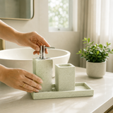 Textured bathroom accessories set with soap dispenser, tumbler and tray