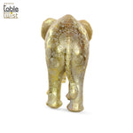 The Rustic Carved Golden Elephant Sculpture.