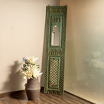 Vintage-Inspired Turquoise Wooden Mirror with Ornate Carvings.