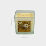  White Square Aroma Candle with Golden Floral Design.