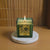 Luxury Green Square Aroma Candle with Golden Floral Design